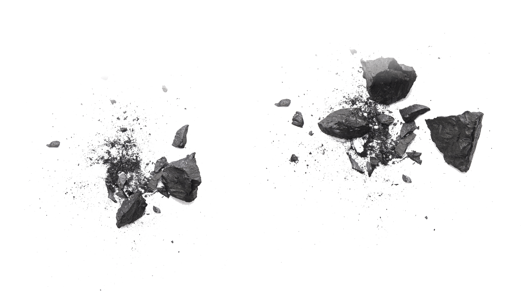 Pieces of broken black coal isolated on white background